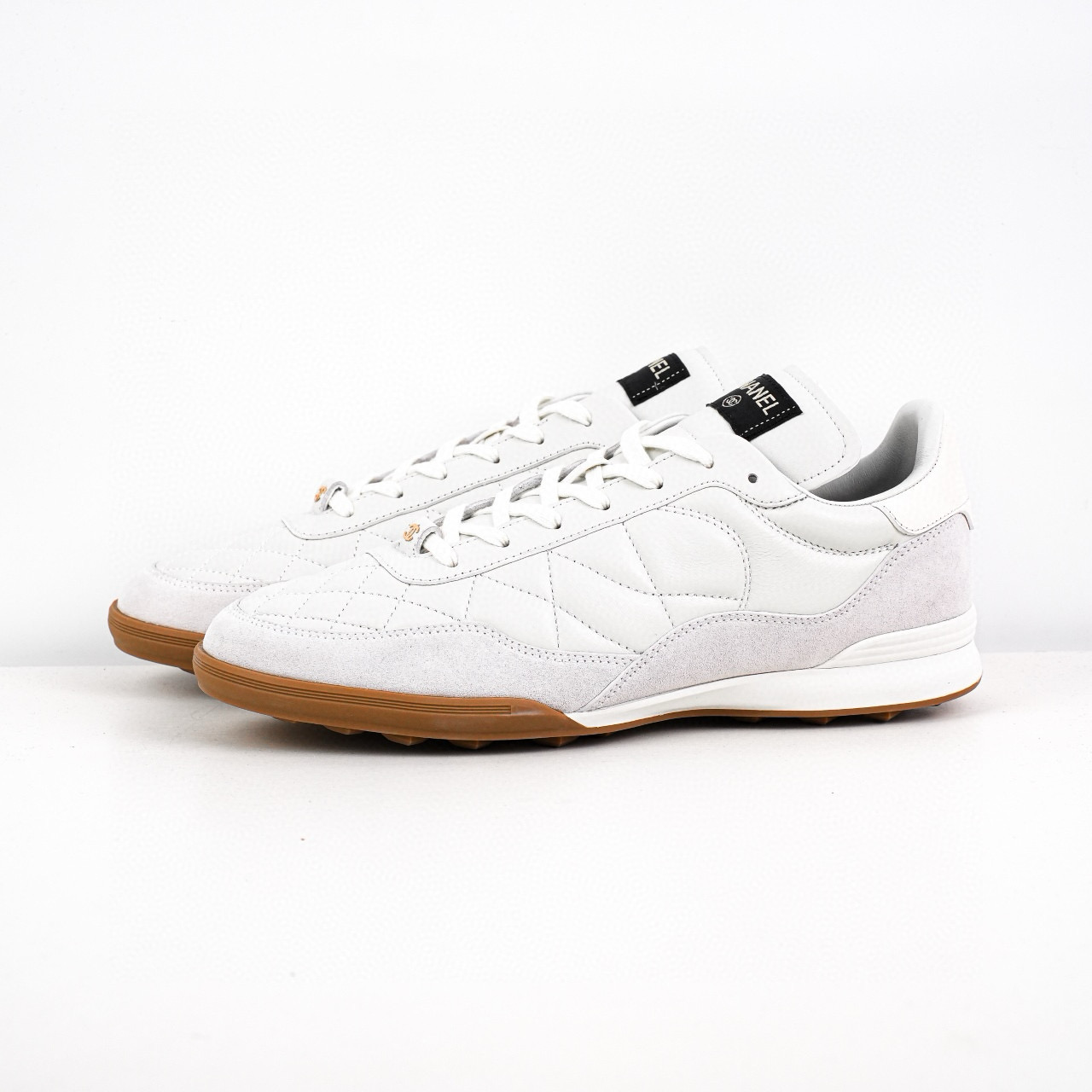 Chanel CC Quilted Calfskin Suede Sneakers