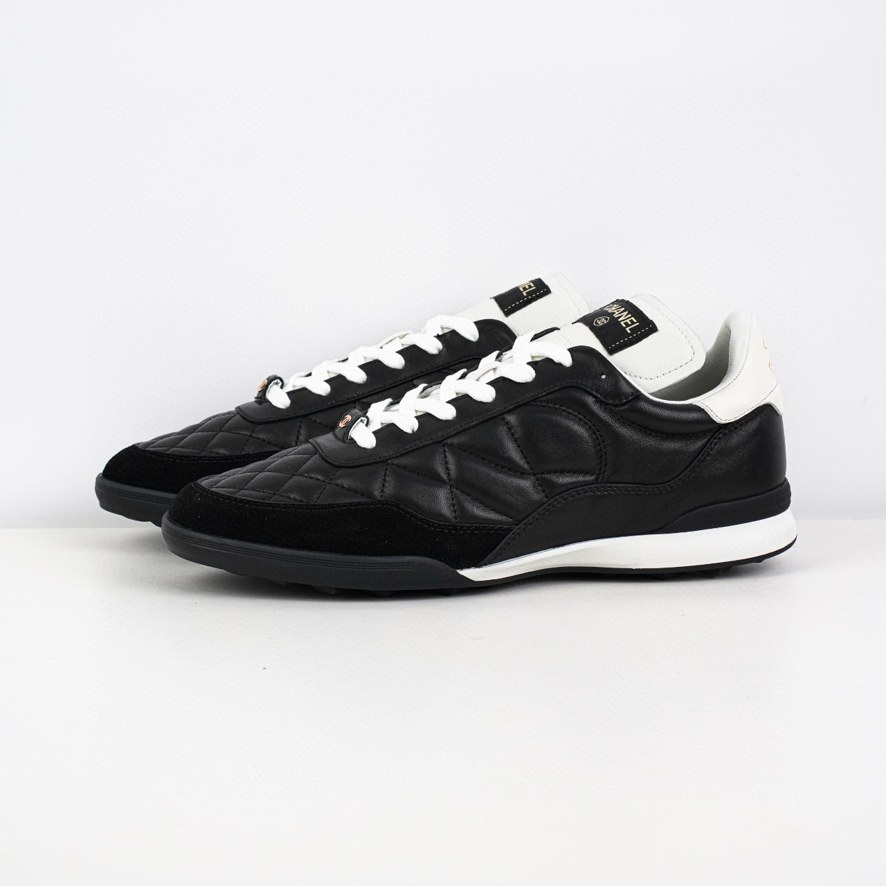 Chanel CC Quilted Calfskin Suede Sneakers