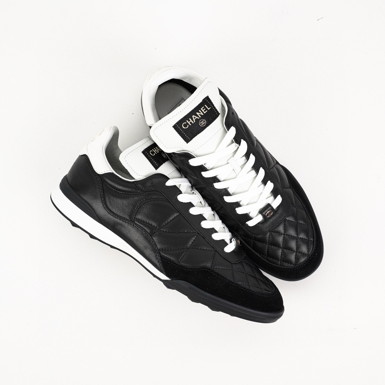 Chanel CC Quilted Calfskin Suede Sneakers