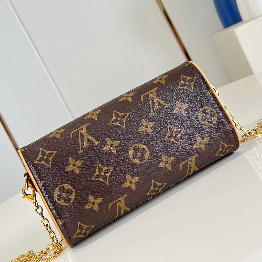 Louis Vuitton  Pochette Camille Monogram