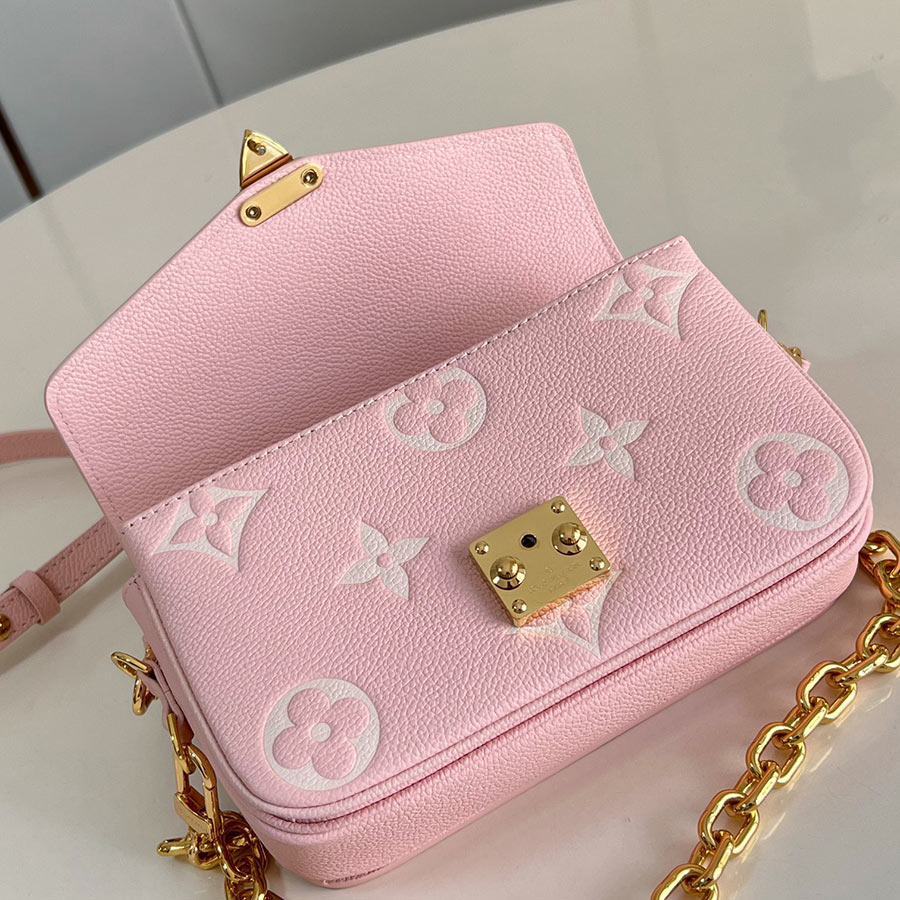 Louis Vuitton Pochette Métis East West Monogram Empreinte Louis Vuitton Pochette Métis East West Monogram Empreinte
