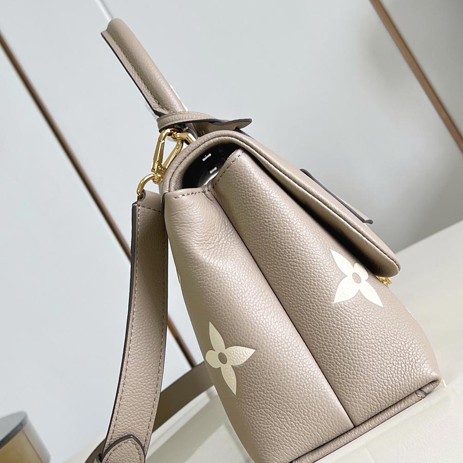 Louis Vuitton Madeleine Monogram Empreinte