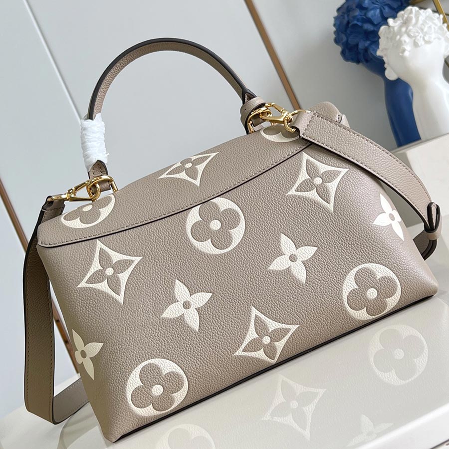 Louis Vuitton Madeleine Monogram Empreinte