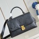 Louis Vuitton Madeleine Monogram Empreinte