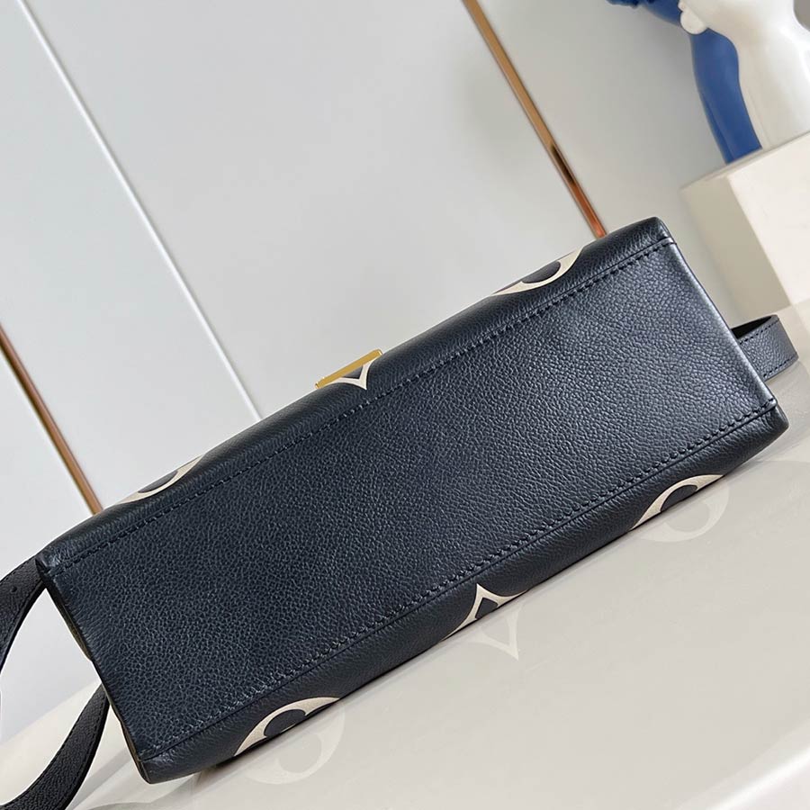 Louis Vuitton Madeleine Monogram Empreinte