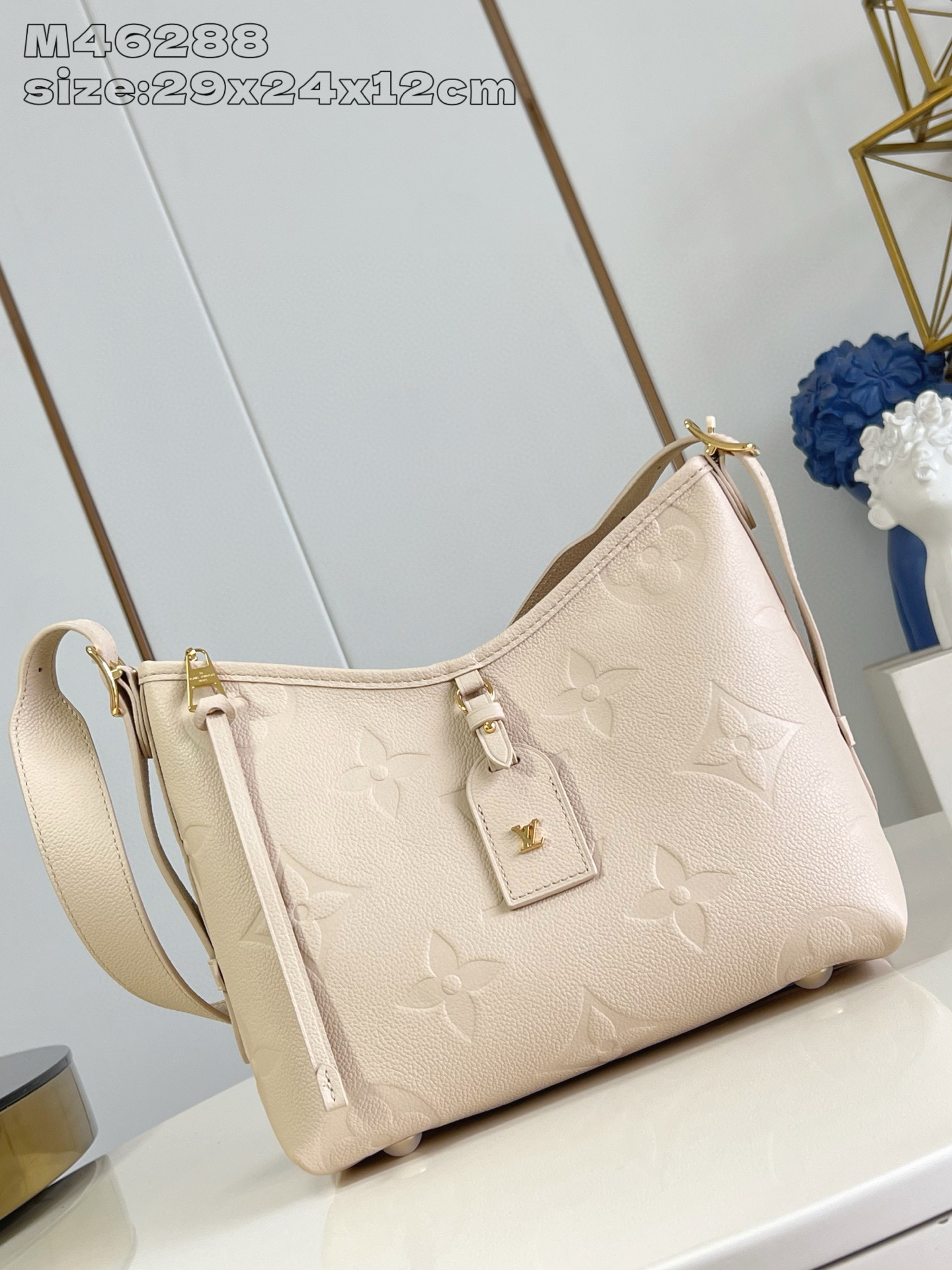 LOUIS VUITTON CARRYALL PM MONOGRAM EMPREINTE LEATHER