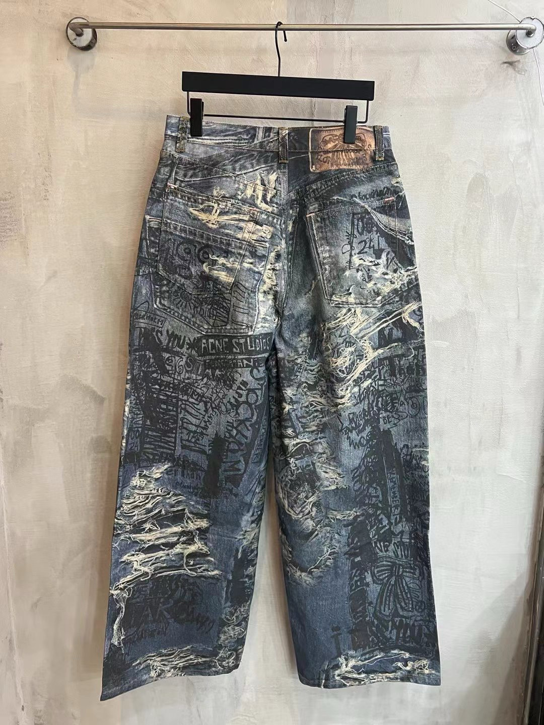 Acne Studio Trompe-l’oeil print jeans